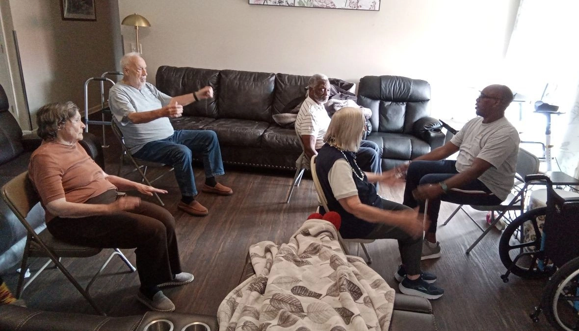 Nurse engaging with senior residents at a senior care community