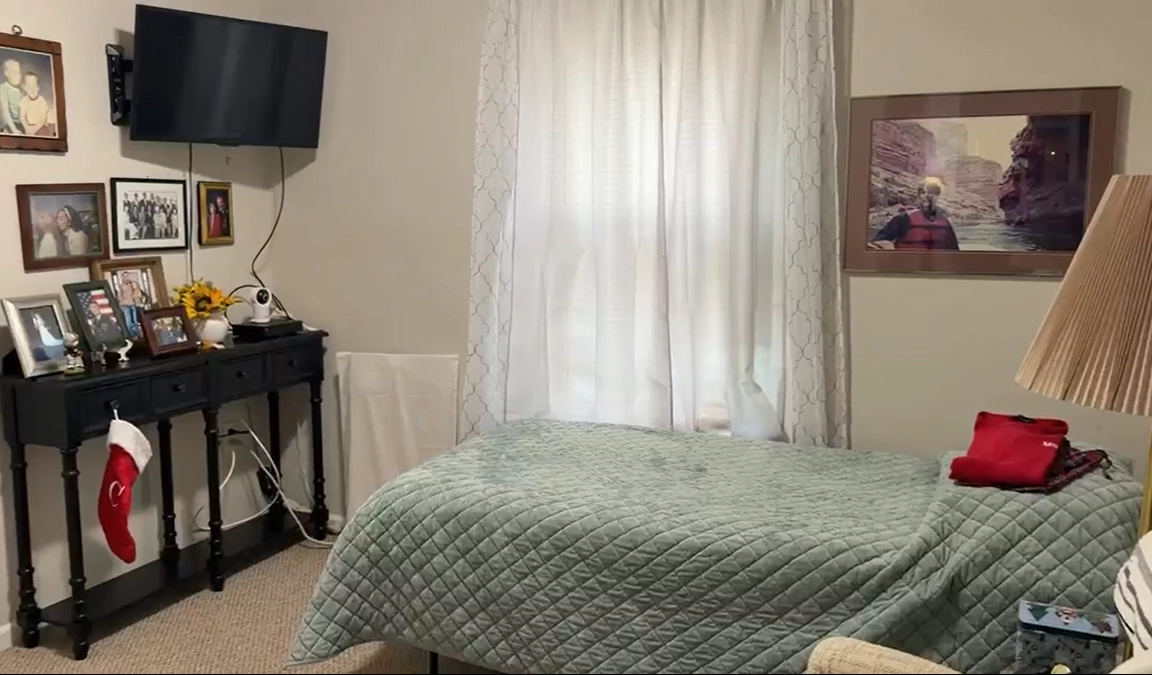 Comfortable bedroom at Apex House senior care residence