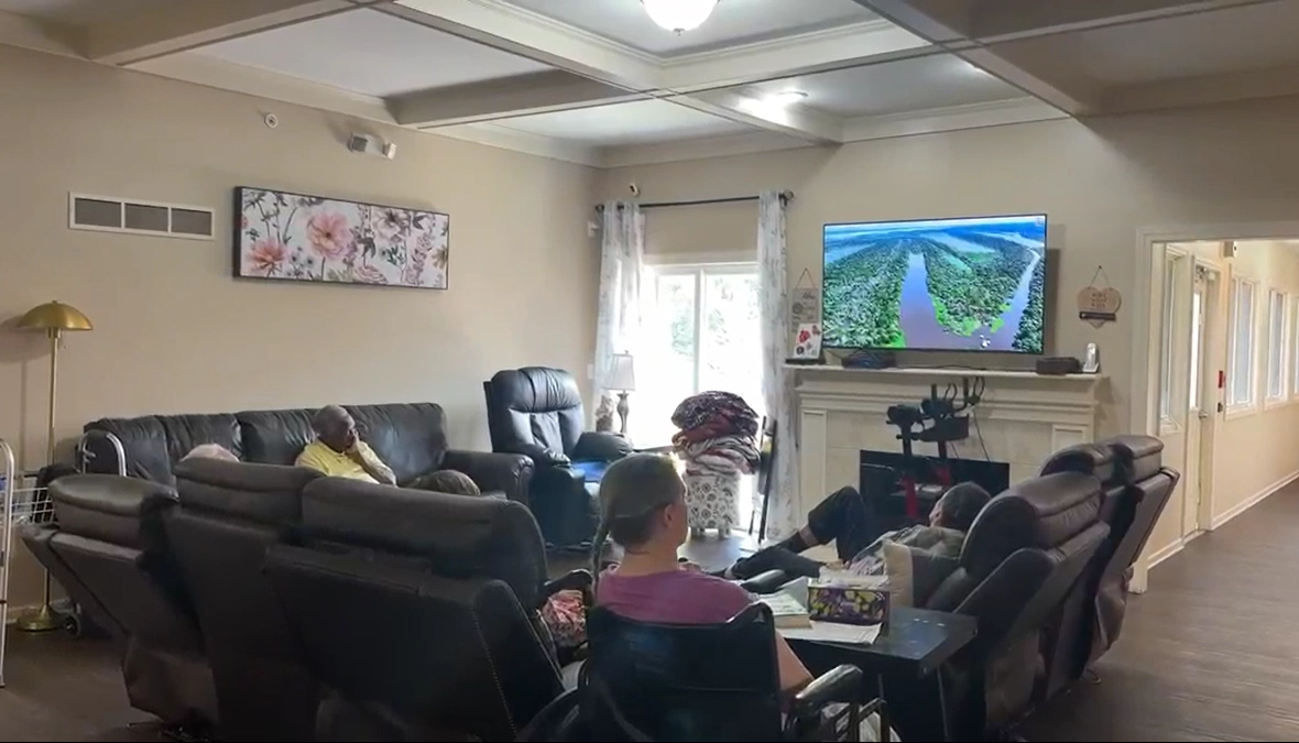 Seniors at Grace house watching TV