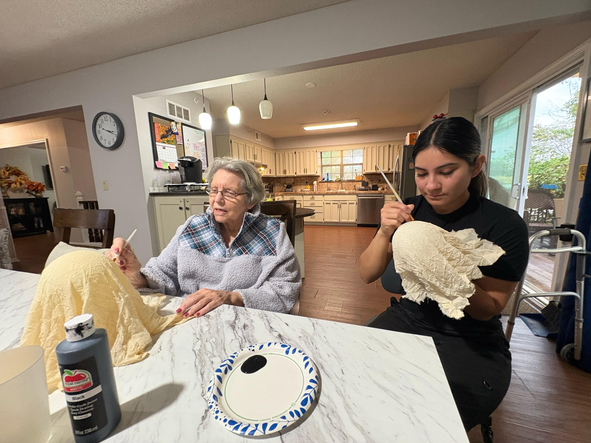Goshen nurse checking on a resident at night