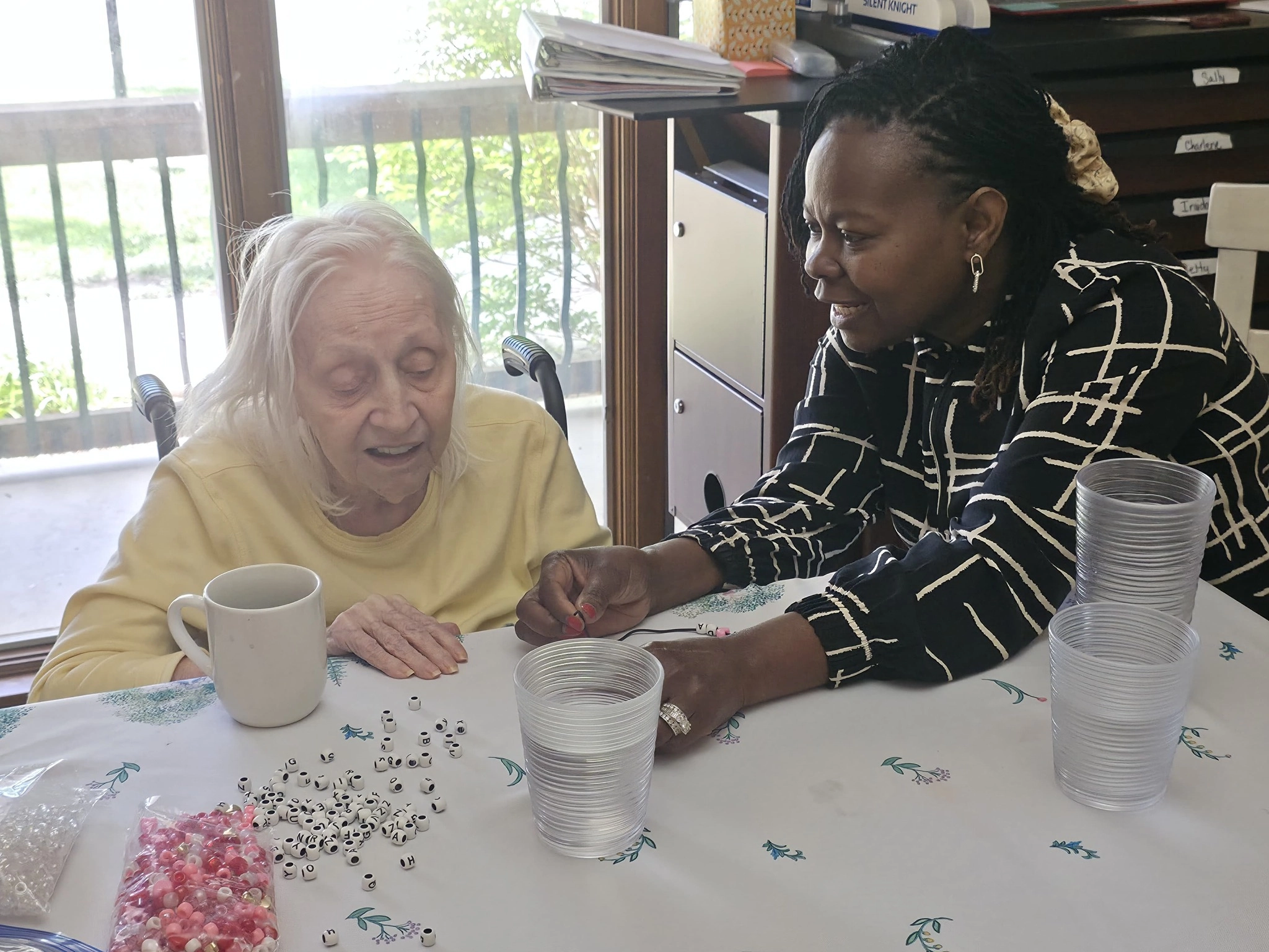 Nurse providing care and support to a senior resident at a senior care community